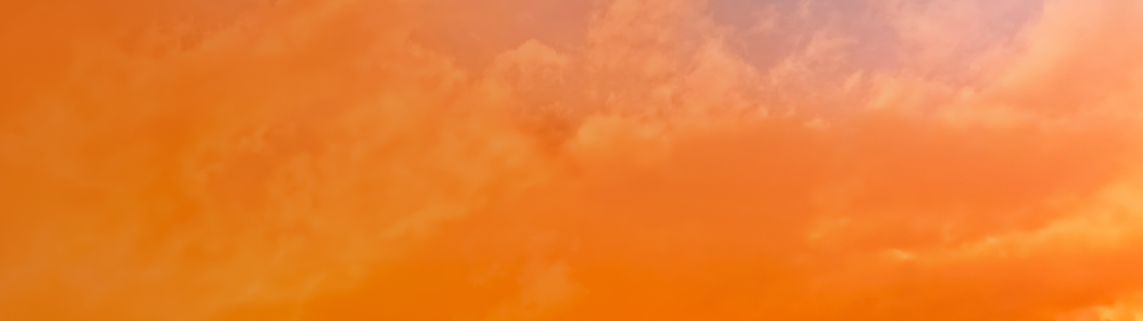 VEEV ONE Gerät mit großem lila V im Vordergrund, Hintergrund orange