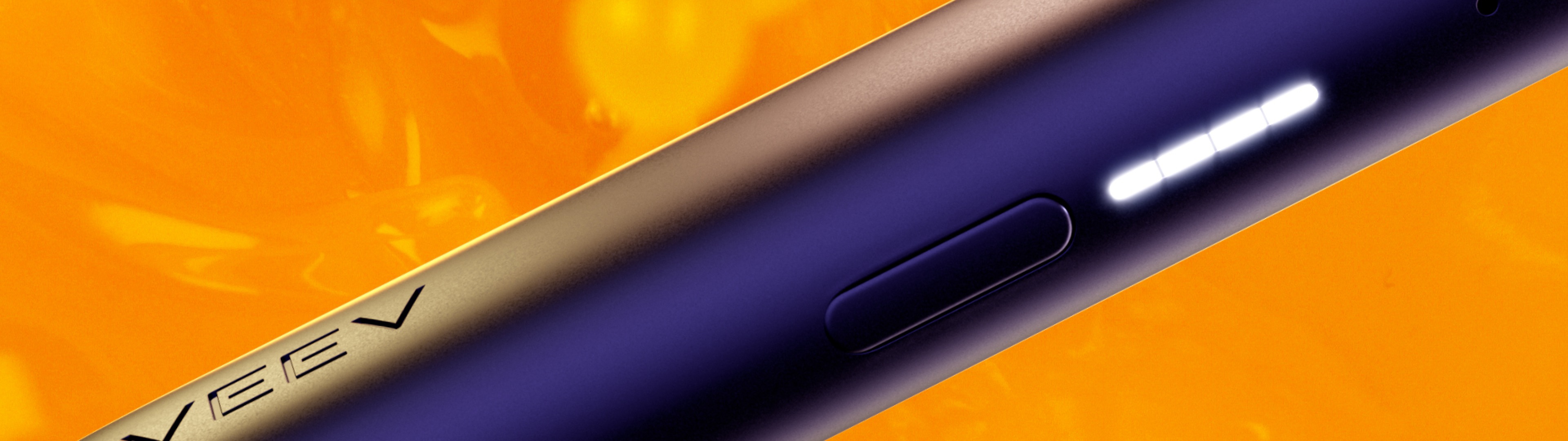VEEV ONE Device close up showing purple hardware and lights
