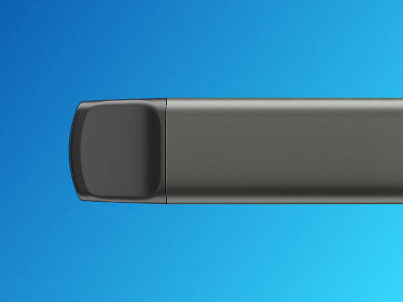 Close up of the VEEV NOW device on a blue background
