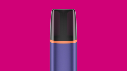 Close up of VEEV ONE vape mouthpiece on a pink background